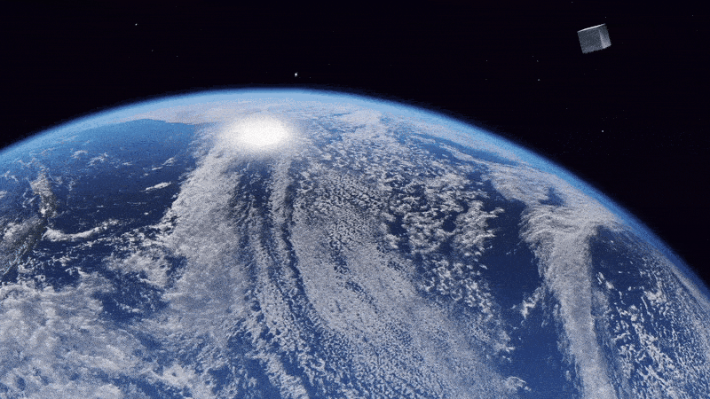 Animated image of cube satellite in orbit around Earth.