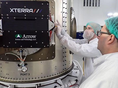 Arrow Science & Technology engineers installing the XTERRA cubesat deployer in a cleanroom environment.