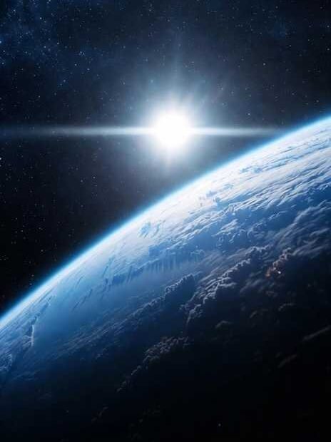 First Ashes to Space Mission view from orbit. Sun on the horizon, Earth below.