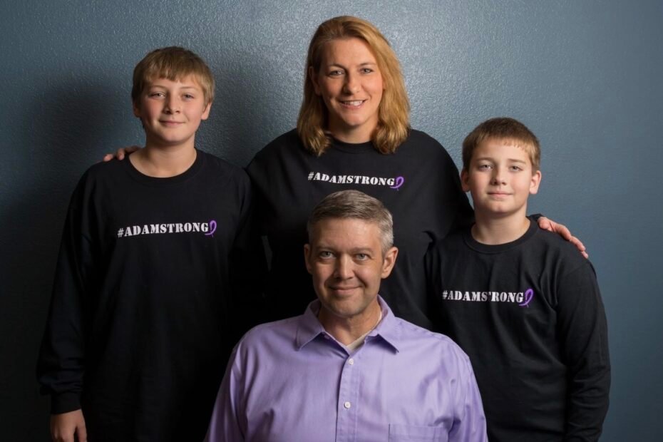 Ashtronaut Adam Alan Mesenbrink surrounded by his wife and sons wearing #Adamstrong shirts.